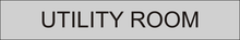 Load image into Gallery viewer,  Essential door sign showcasing 'Utility Room' in clear lettering, marking the entrance to the designated space for utility-related equipment and functions within the facility